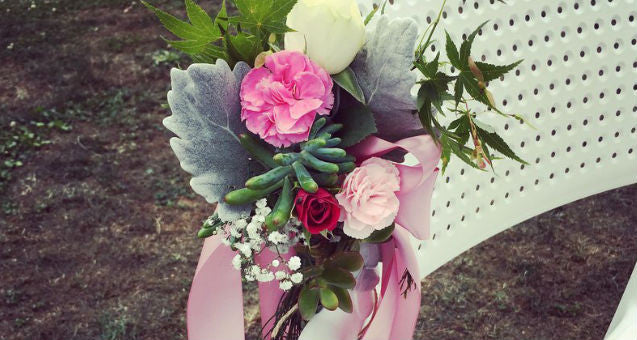 Spray carnations Spay roses Baby breath Sucullents Silver leave Ribbon